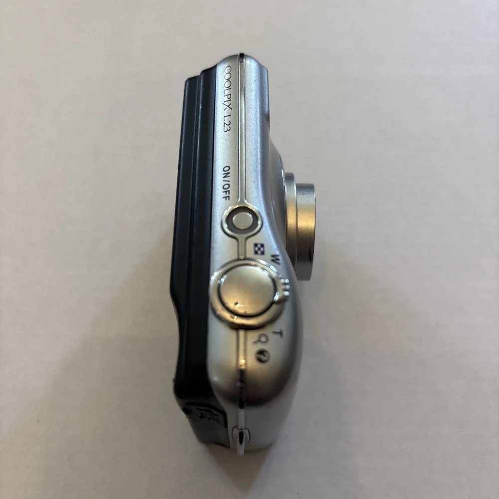 Nikon CoolPix L23‎ 10.1MP Silver Digital Camera - Parts Only